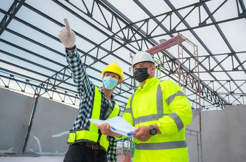 Expert witness and technical consultant reviewing construction documents in Melbourne