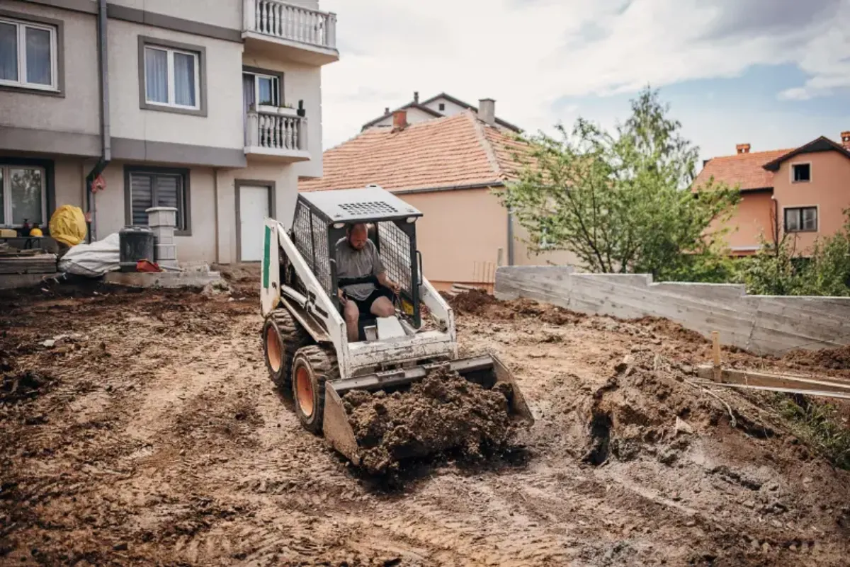 Homeowner documenting storm damage to property for insurance claim in Australia