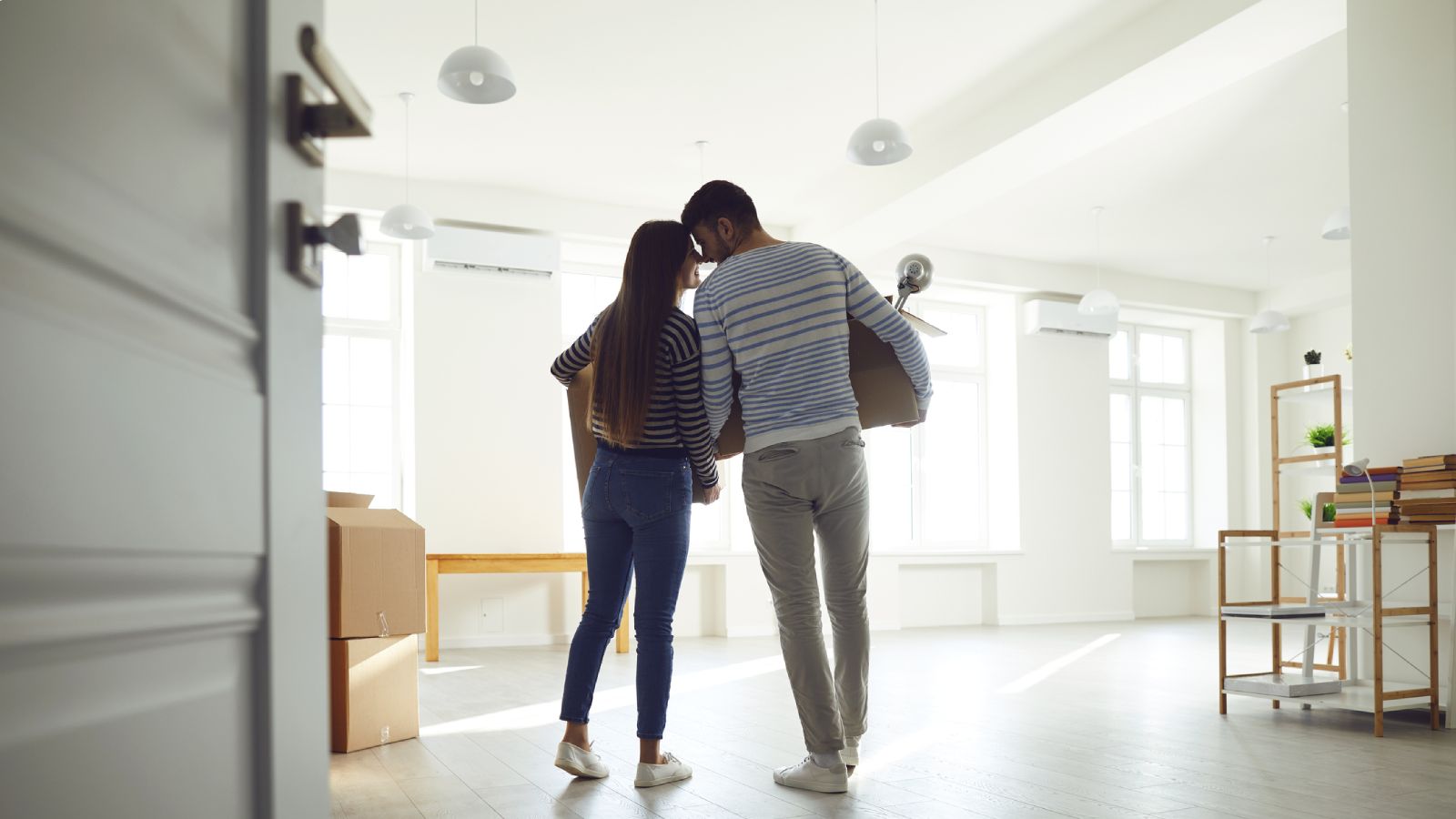Property buyer reviewing pre-purchase inspection report documents