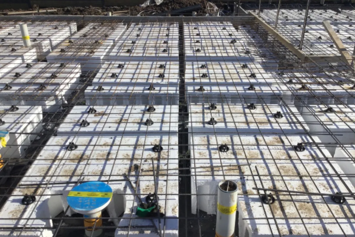 Steel reinforcement and formwork prepared for concrete slab pour on Australian construction site